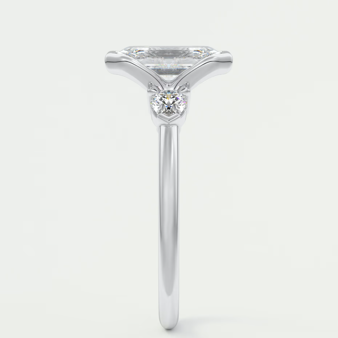 Custom made solara emerald half bezel three-stone engagement ring | diamond lab