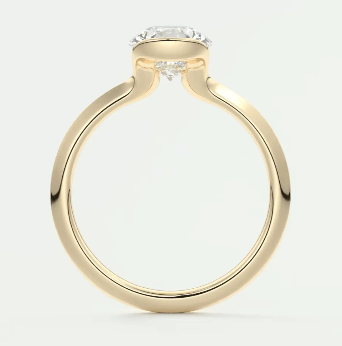18-karat yellow gold engagement ring with a round diamond center stone.