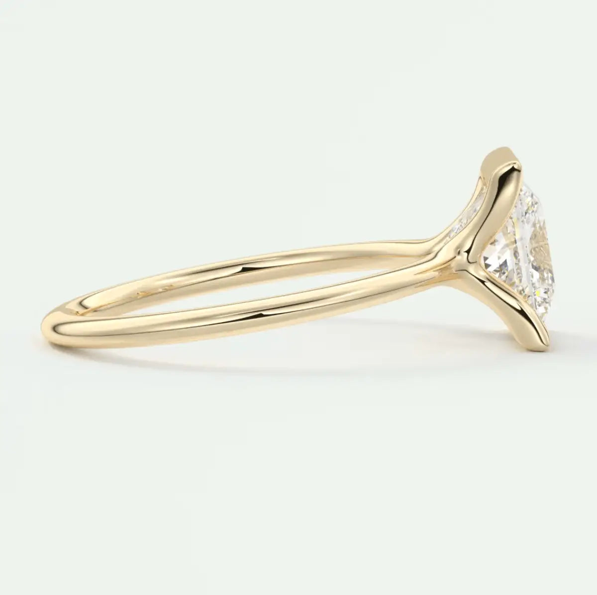 18k yellow gold princess cut diamond engagement ring.