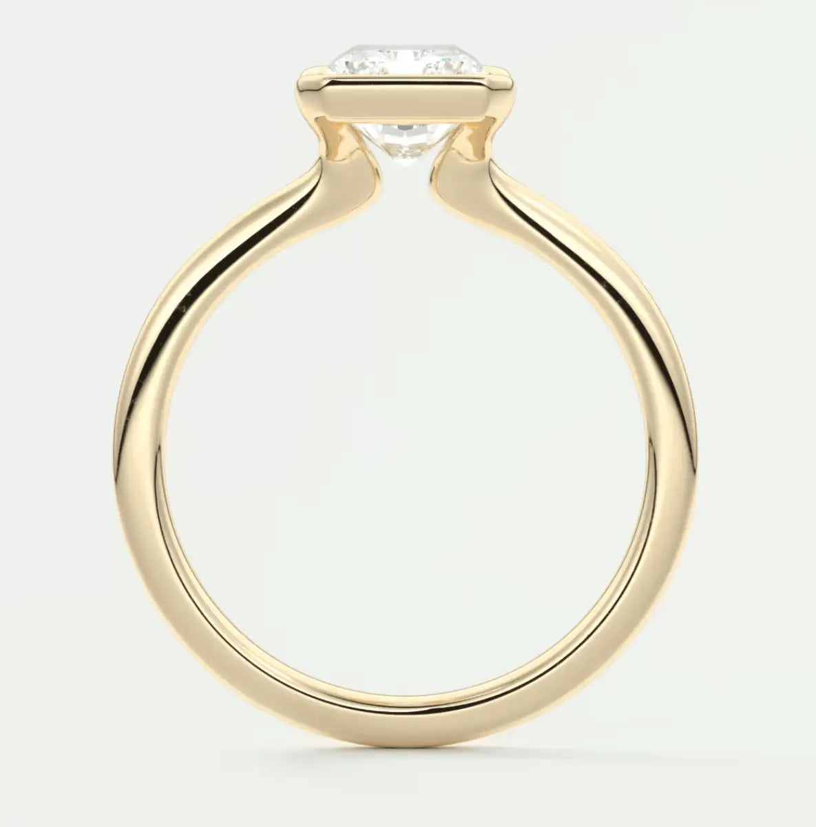 18k yellow gold engagement ring with a princess cut diamond.