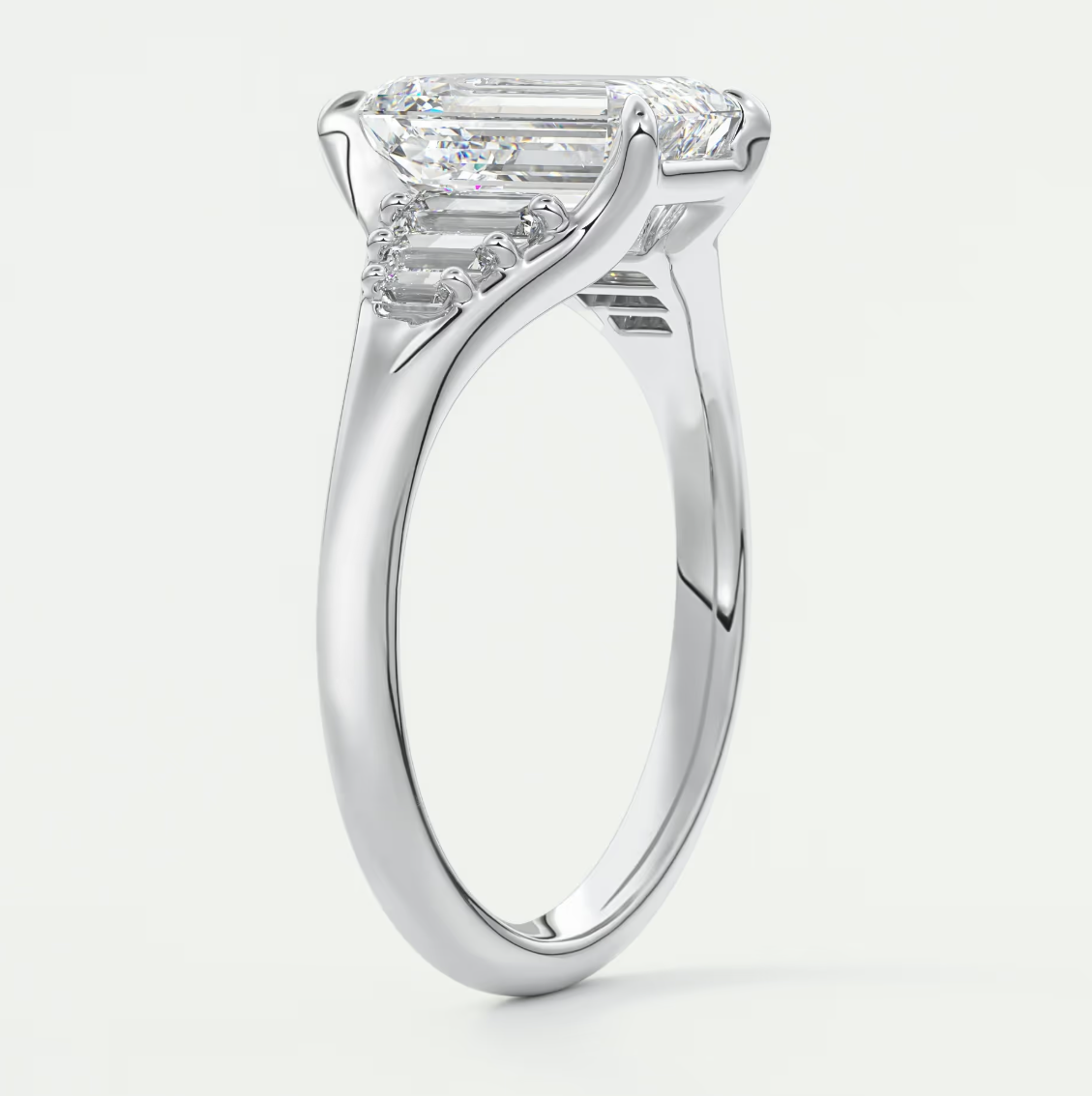 Custom made solena emerald split shank engagement ring with baguette side stones | diamond lab