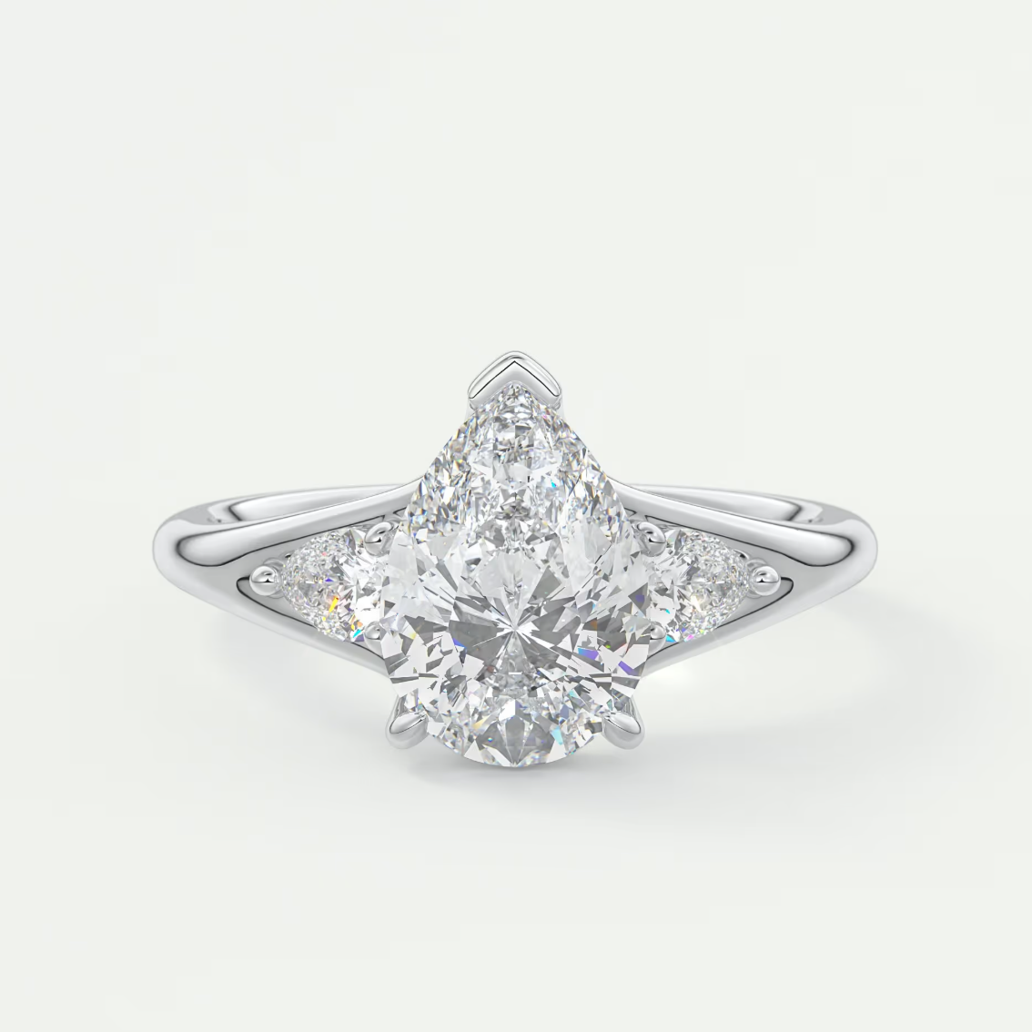Custom made solena pear three-stone engagement ring with split shank | diamond lab
