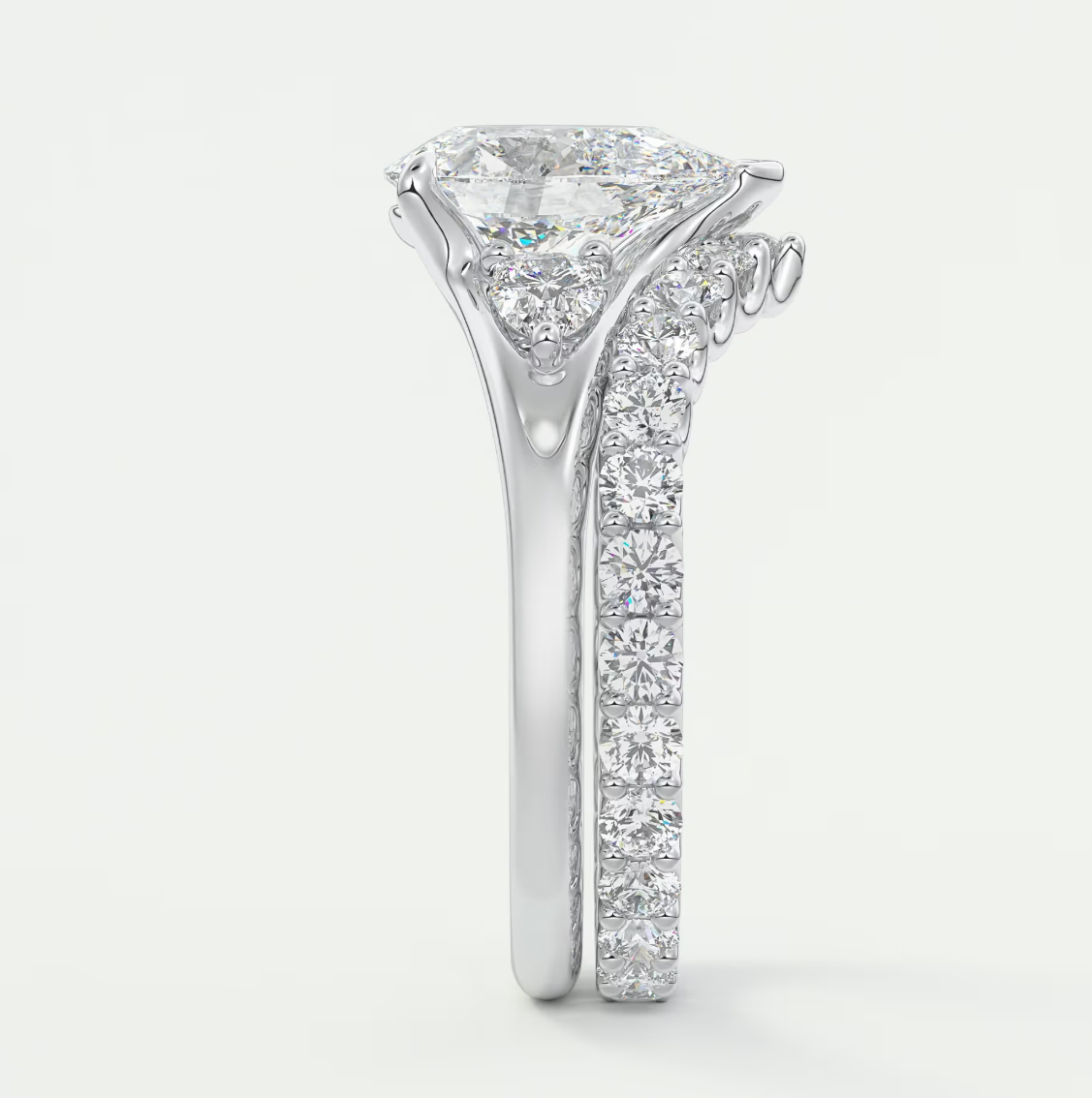 Custom made solena pear three-stone engagement ring with split shank | diamond lab