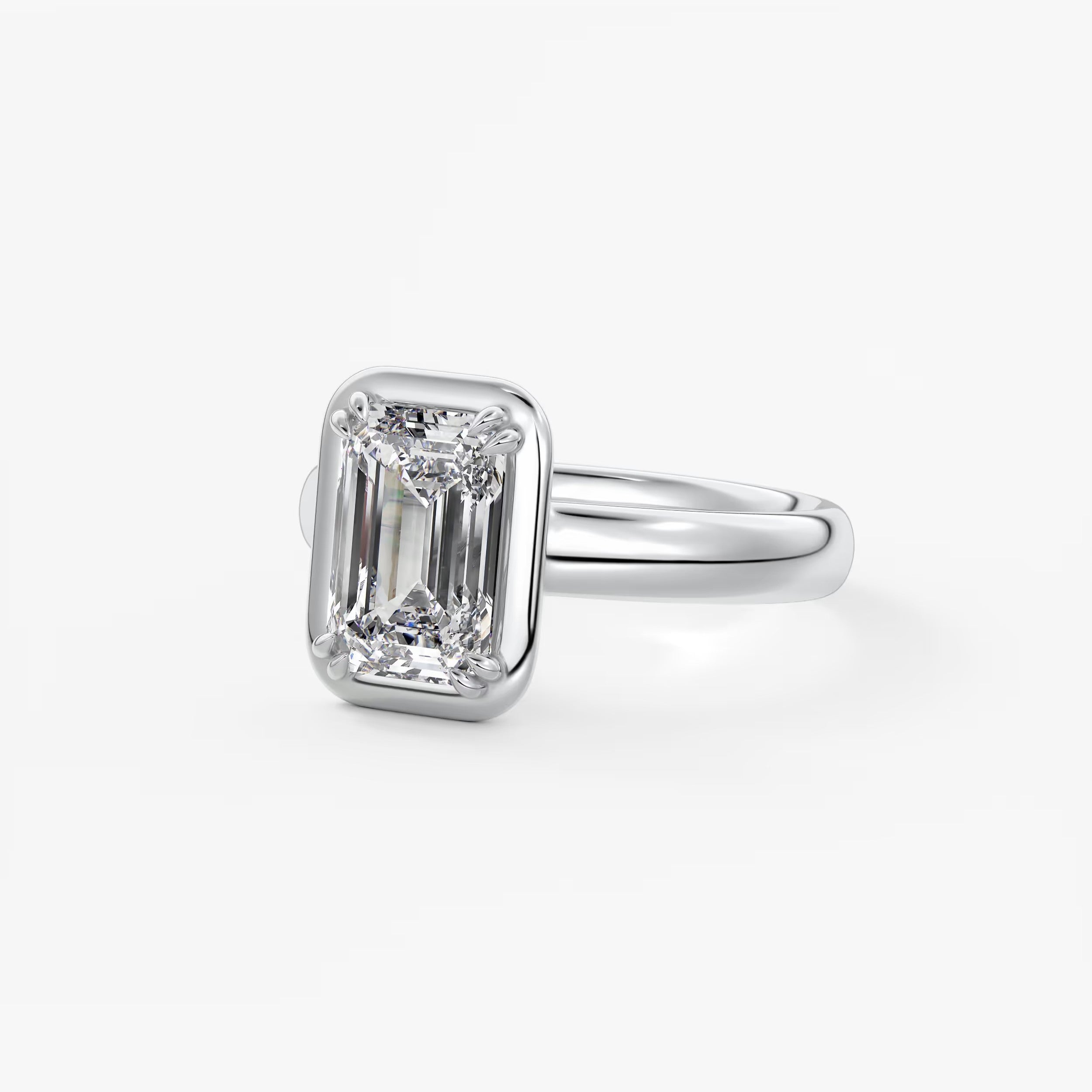 Custom made taylor grande emerald lab diamond bezel engagement ring | australia