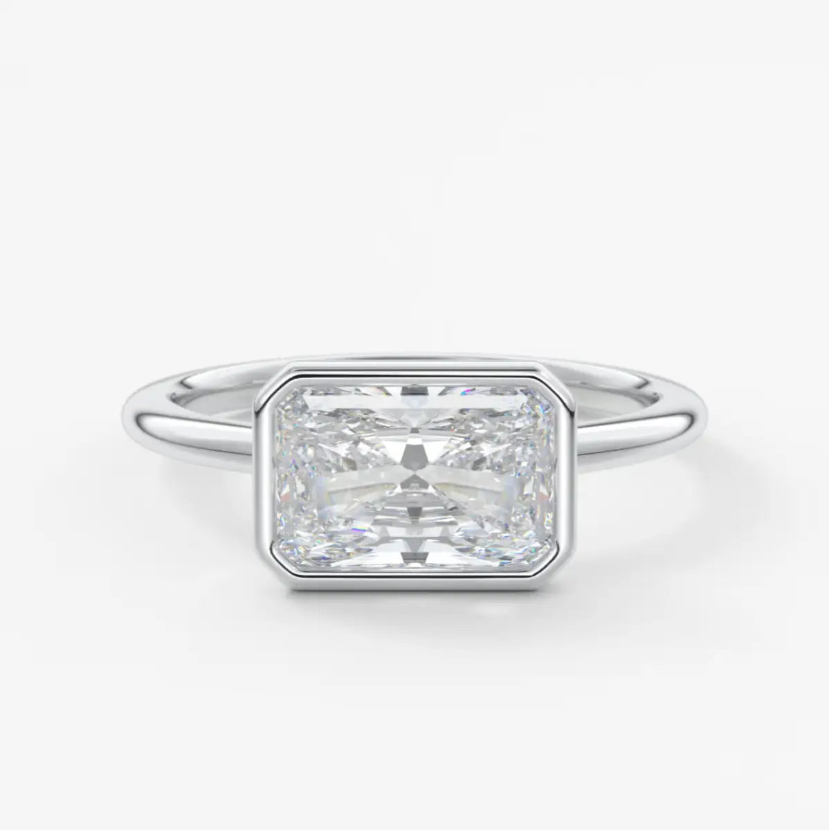 Custom made véda east-west radiant bezel engagement ring | lab diamond or moissanite –