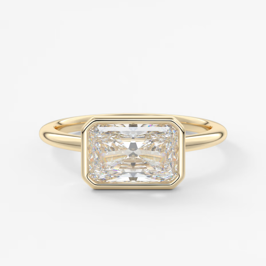 Custom made véda east-west radiant bezel engagement ring | lab diamond or moissanite –