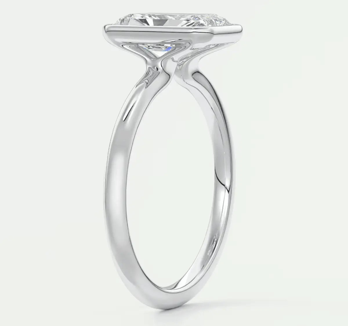 18k white gold engagement ring with a marquise-cut diamond.