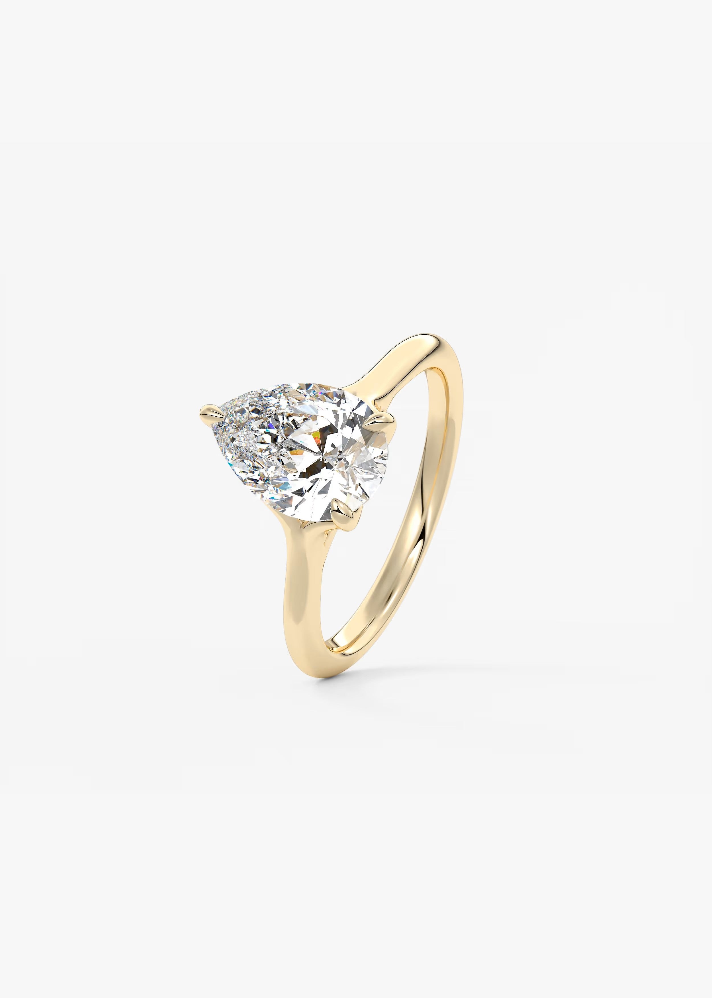 Cassia – Pear Solitaire with Triple-Claw Prongs