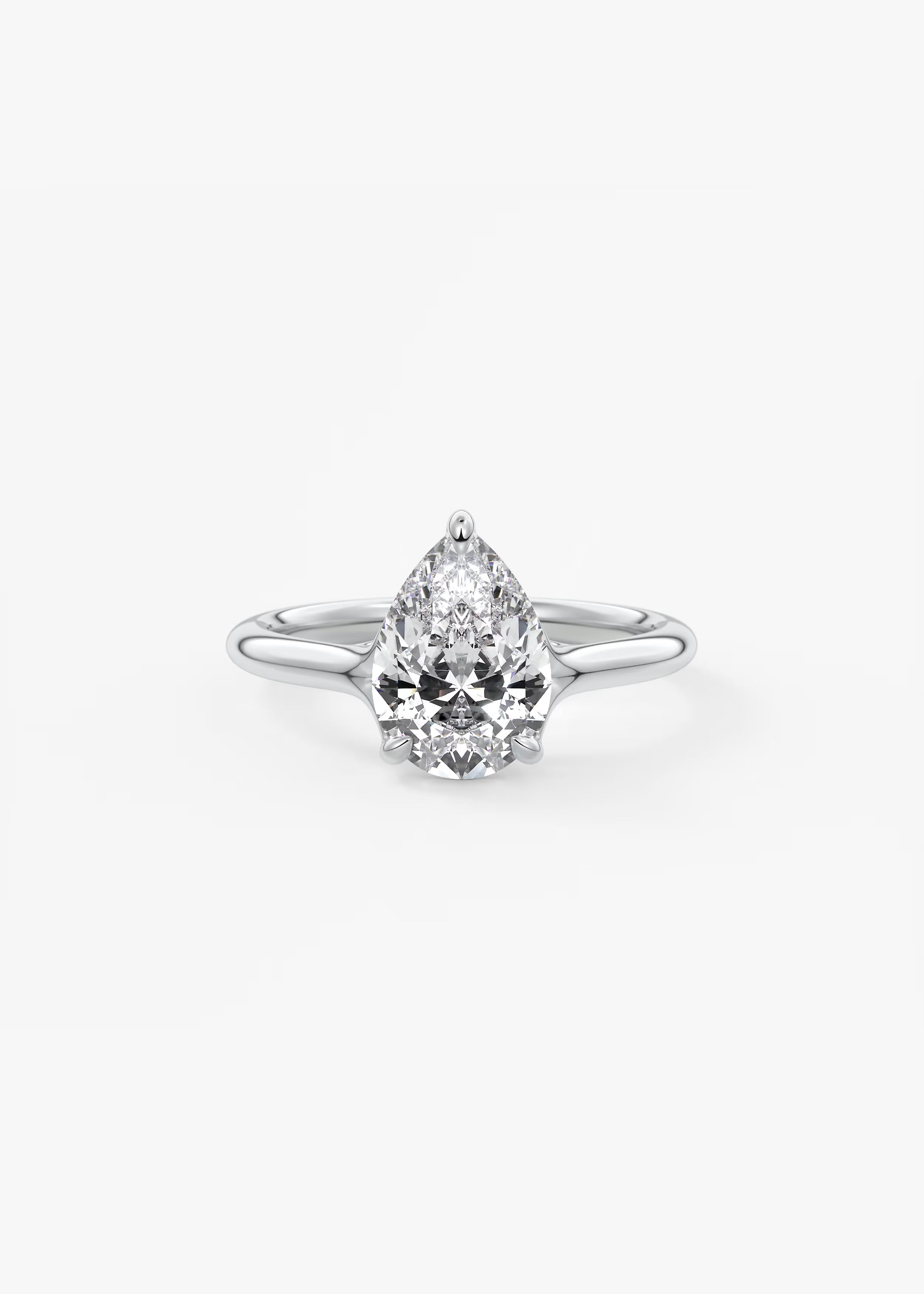 Cassia – Pear Solitaire with Triple-Claw Prongs