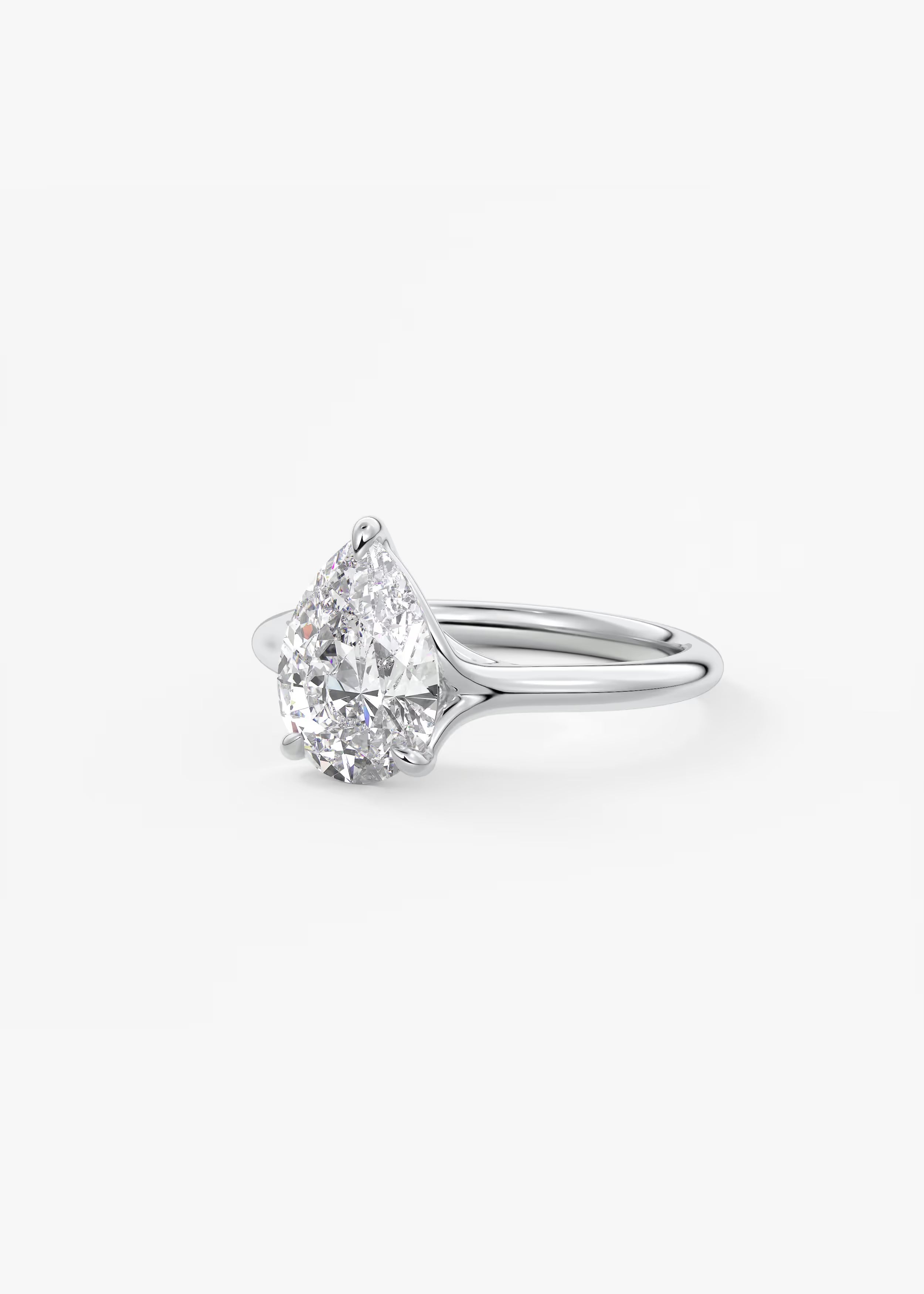 Cassia – Pear Solitaire with Triple-Claw Prongs
