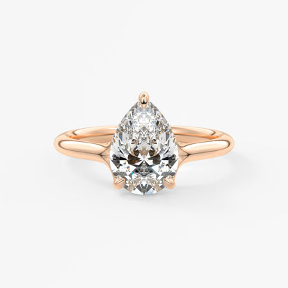 Cassia – pear solitaire with triple-claw prongs