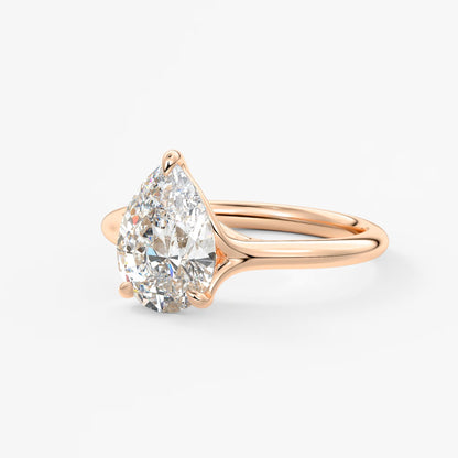Cassia – pear solitaire with triple-claw prongs