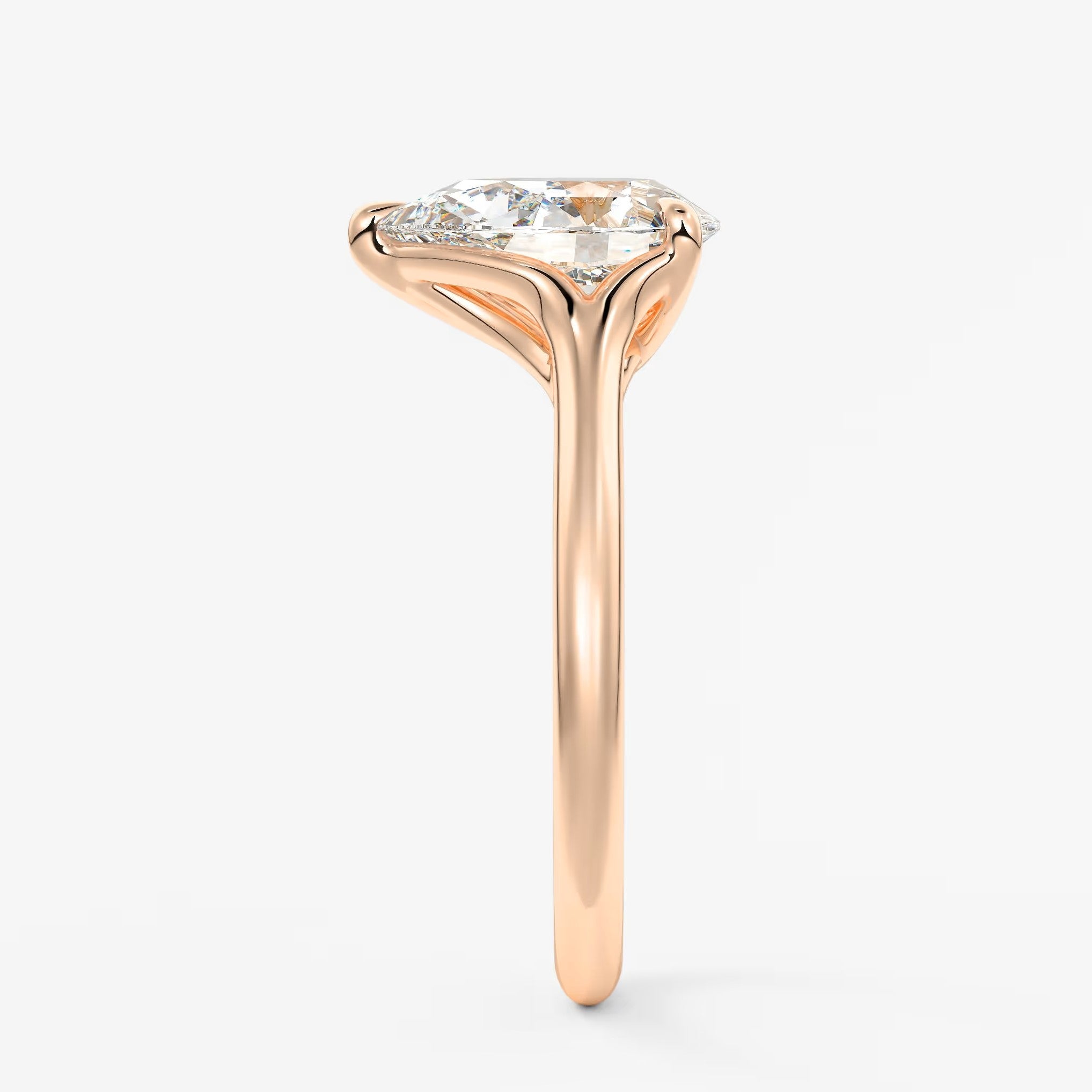 Cassia – pear solitaire with triple-claw prongs