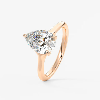 Cassia – pear solitaire with triple-claw prongs