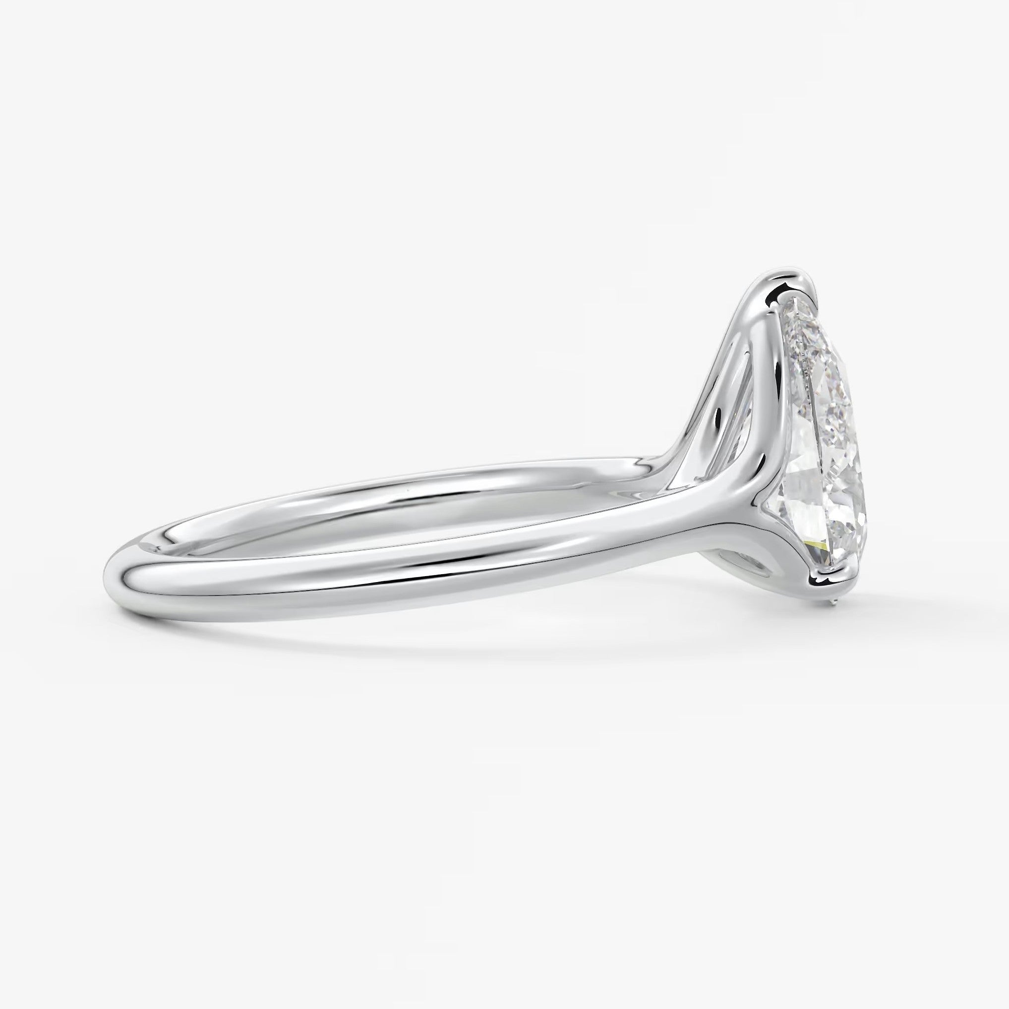 Cassia – pear solitaire with triple-claw prongs