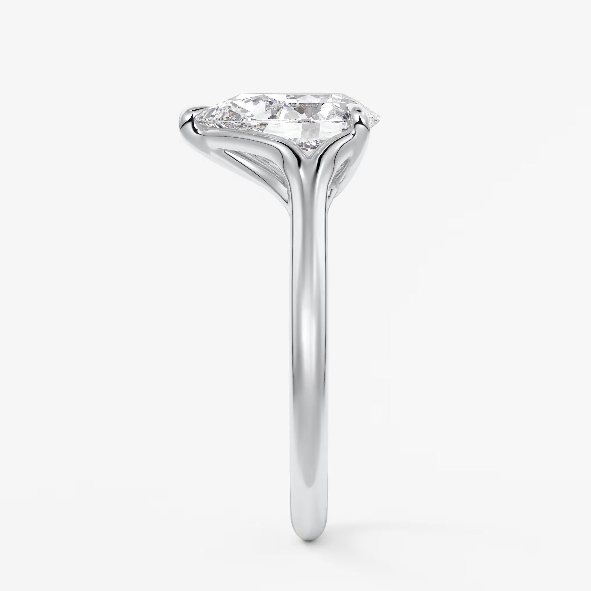 Cassia – pear solitaire with triple-claw prongs