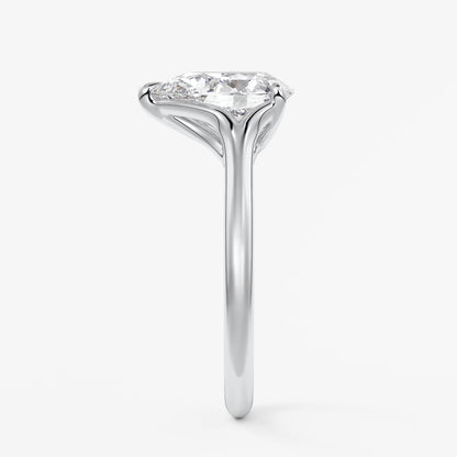 Cassia – pear solitaire with triple-claw prongs