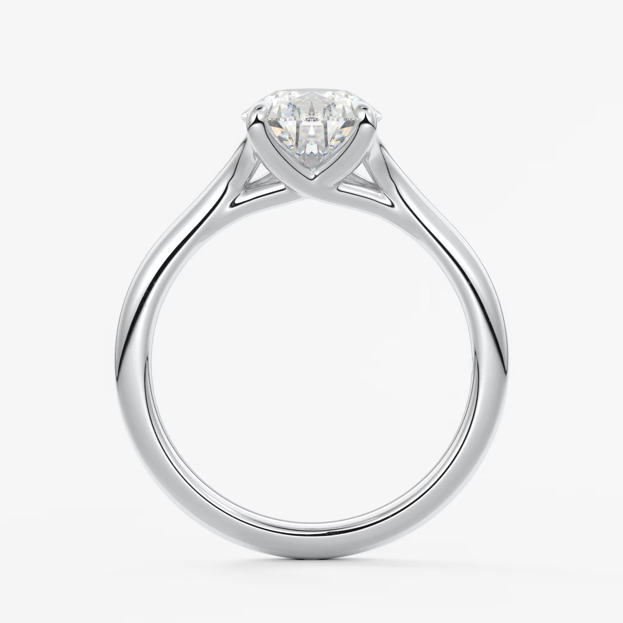 Cassia – pear solitaire with triple-claw prongs