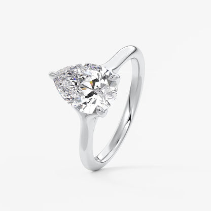 Cassia – pear solitaire with triple-claw prongs