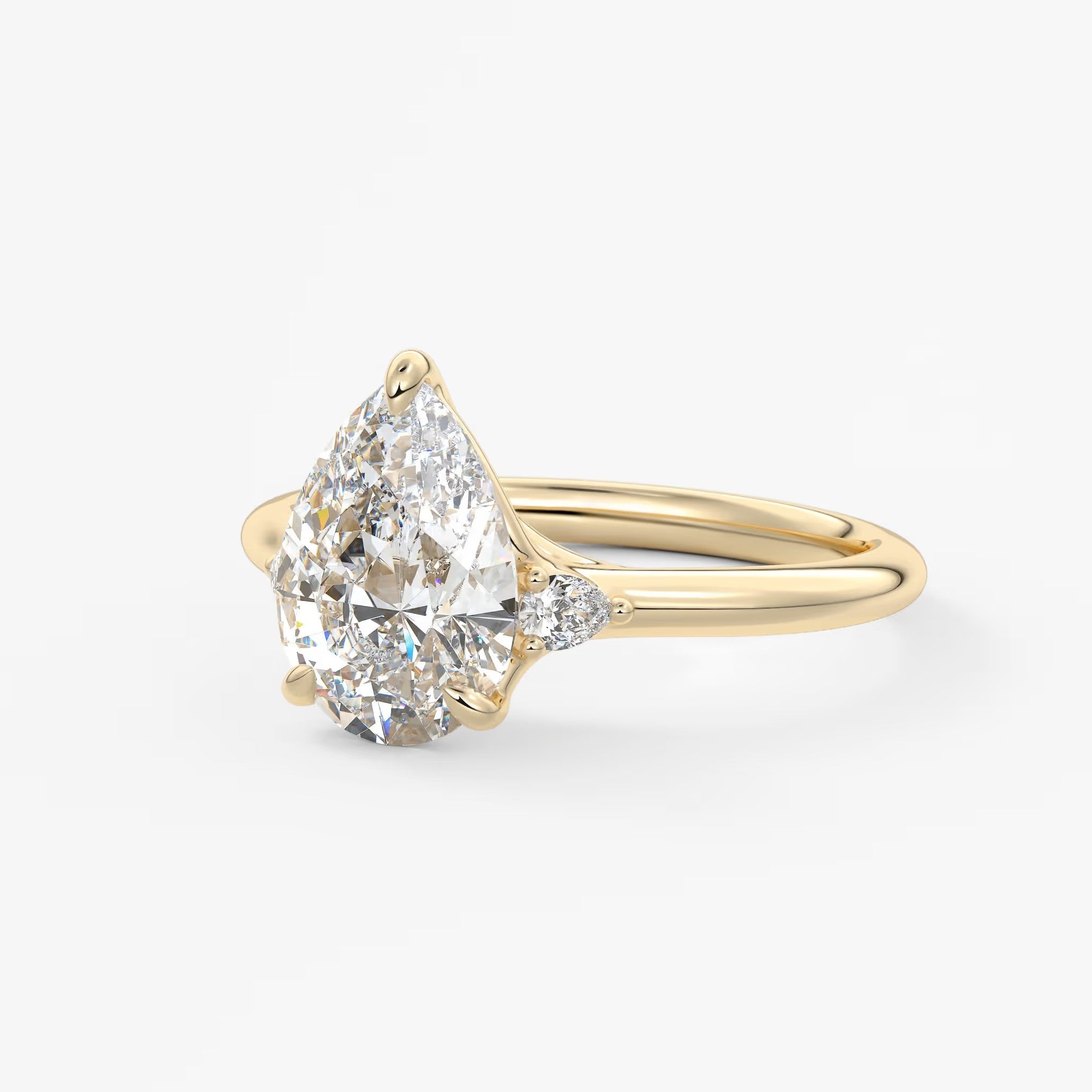 Cassia – pear trilogy with pear side stones