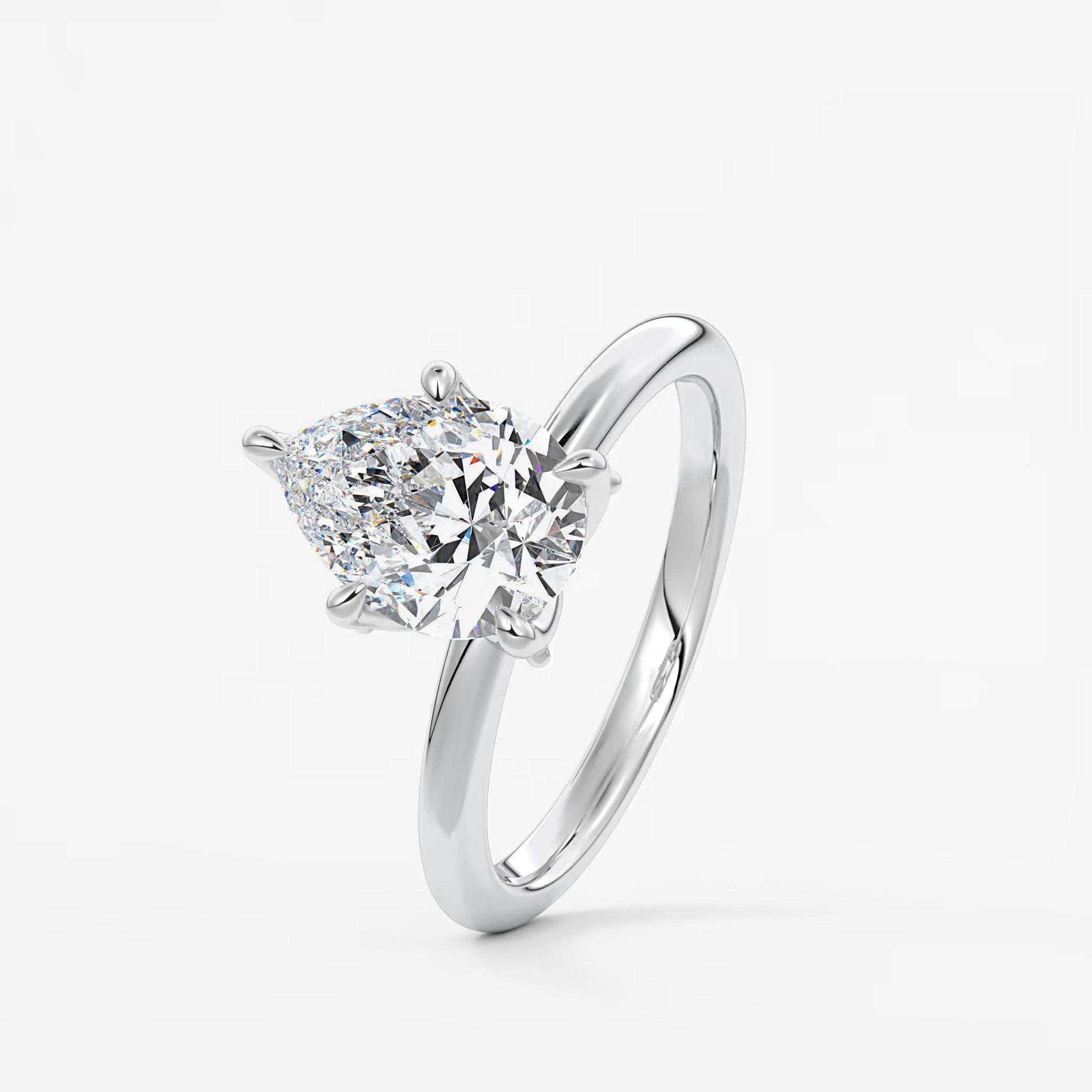 Celestia deluxe – two-tone pear engagement ring