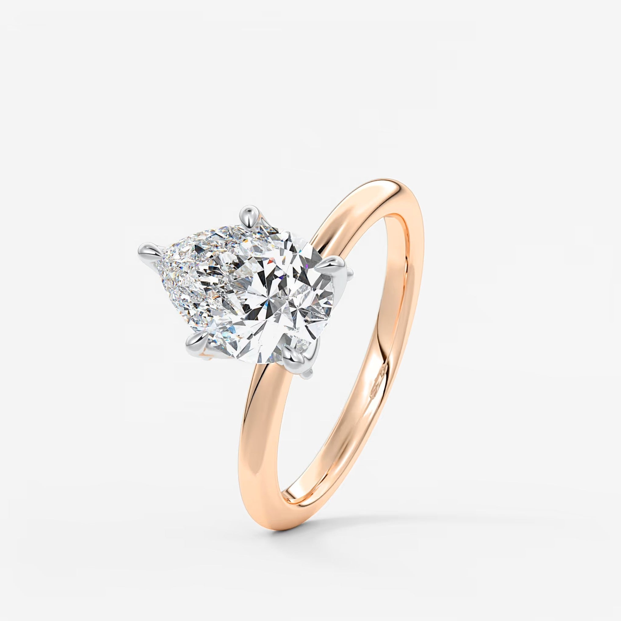 Celestia deluxe – two-tone pear engagement ring