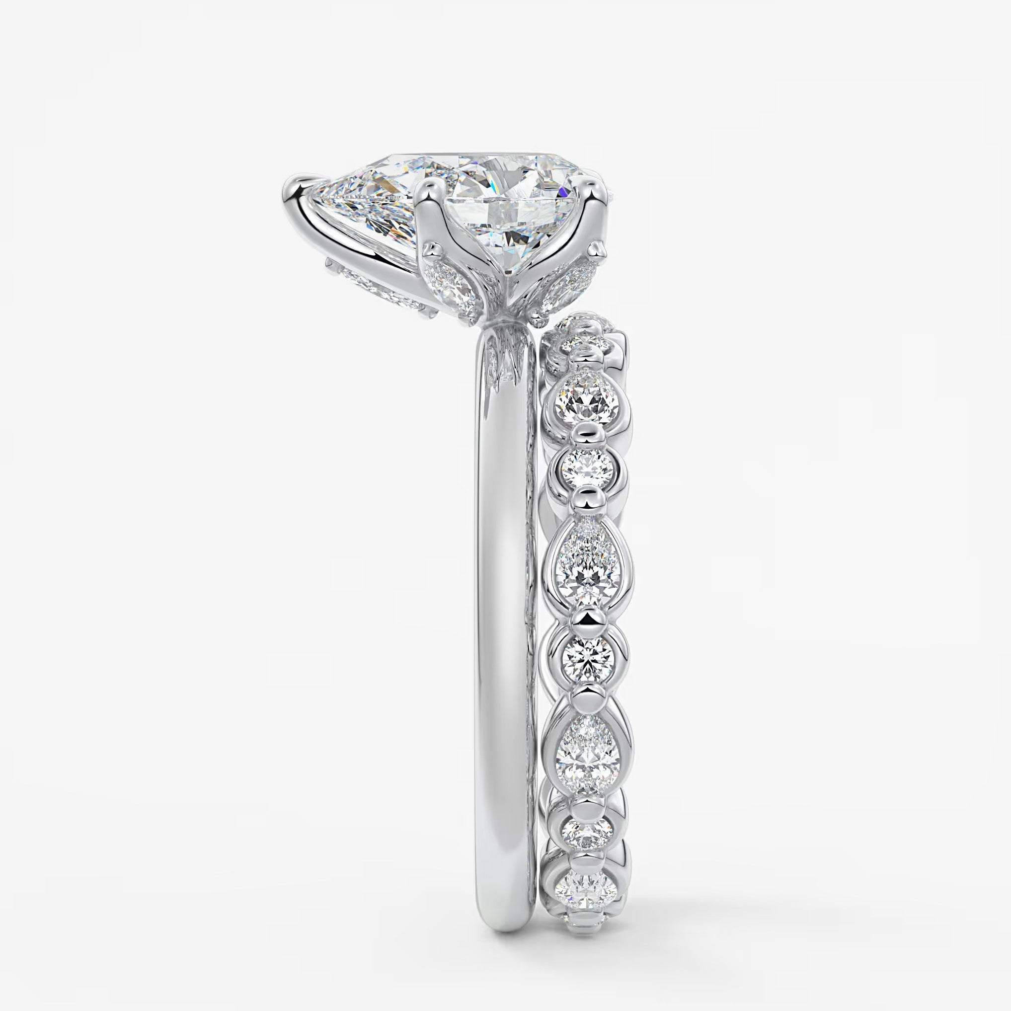 Celestia deluxe – two-tone pear engagement ring
