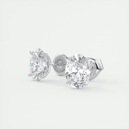 18k white gold diamond stud earrings.