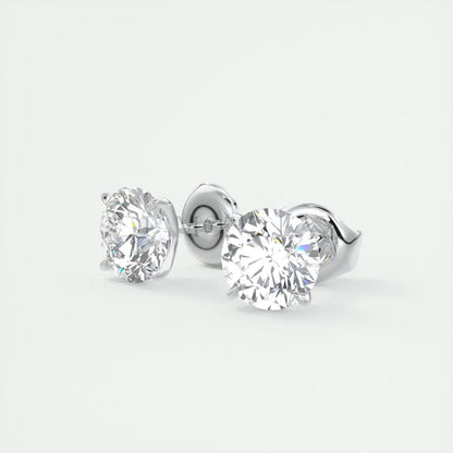 18-karat white gold diamond stud earrings.