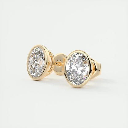 18k yellow gold diamond stud earrings.