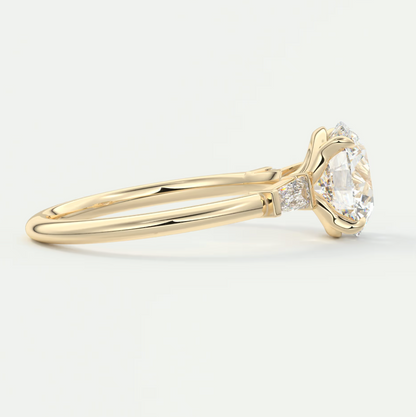 Elysian Round Three-Stone Engagement Ring with Tapered Baguettes