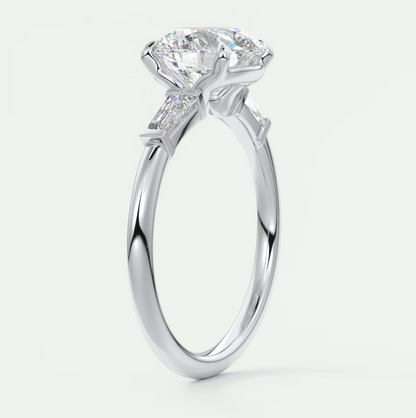 Elysian Round Three-Stone Engagement Ring with Tapered Baguettes