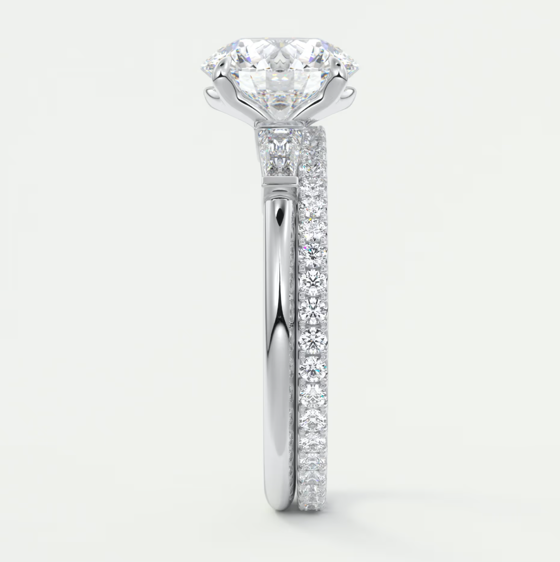 Elysian Round Three-Stone Engagement Ring with Tapered Baguettes