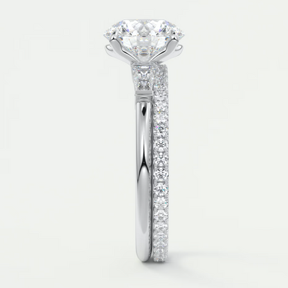 Elysian Round Three-Stone Engagement Ring with Tapered Baguettes