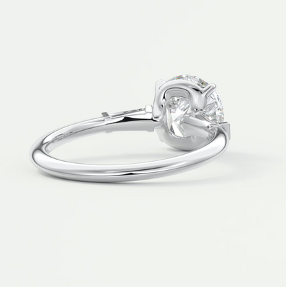 Elysian Round Three-Stone Engagement Ring with Tapered Baguettes