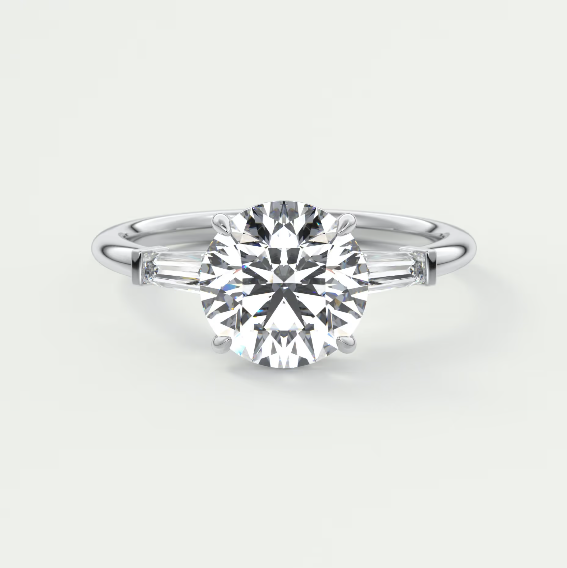 Elysian Round Three-Stone Engagement Ring with Tapered Baguettes