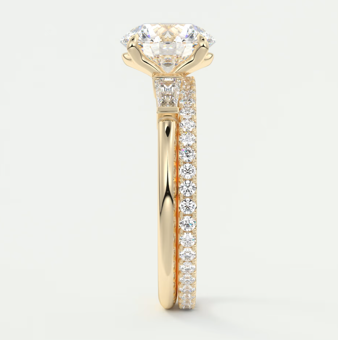 Elysian Round Three-Stone Engagement Ring with Tapered Baguettes