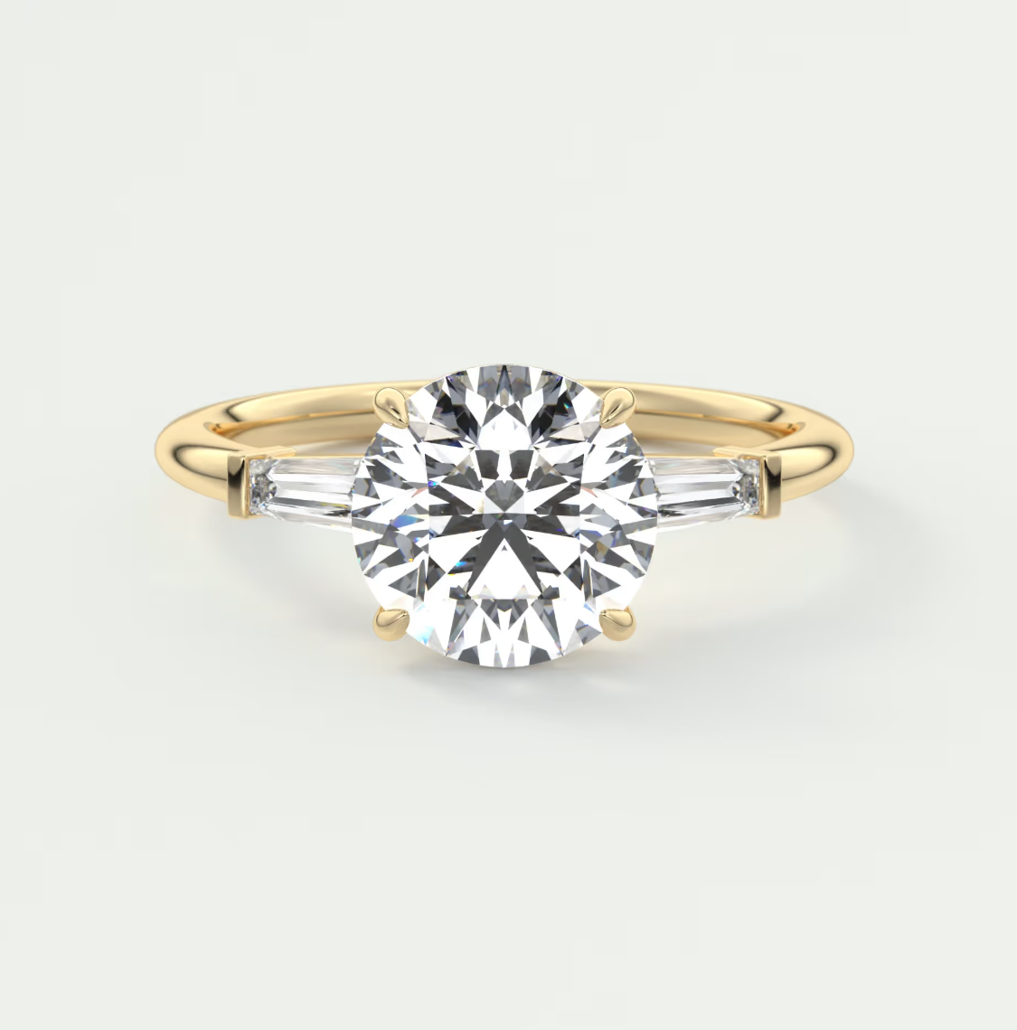 Elysian Round Three-Stone Engagement Ring with Tapered Baguettes