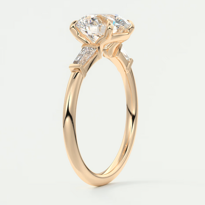 Elysian Round Three-Stone Engagement Ring with Tapered Baguettes