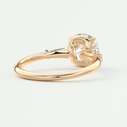 Elysian Round Three-Stone Engagement Ring with Tapered Baguettes