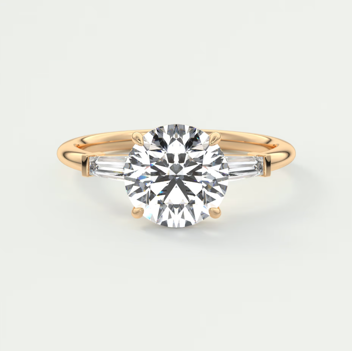Elysian Round Three-Stone Engagement Ring with Tapered Baguettes