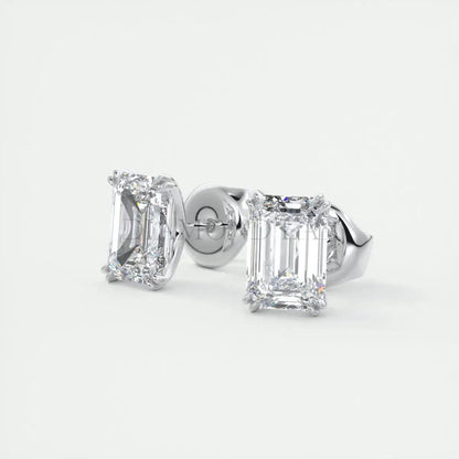 18k white gold diamond stud earrings with emerald cut diamonds.