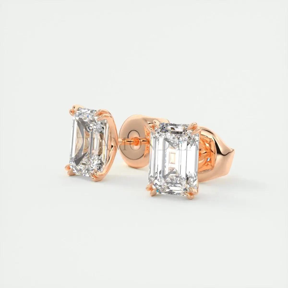 18k rose gold emerald-cut diamond stud earrings.