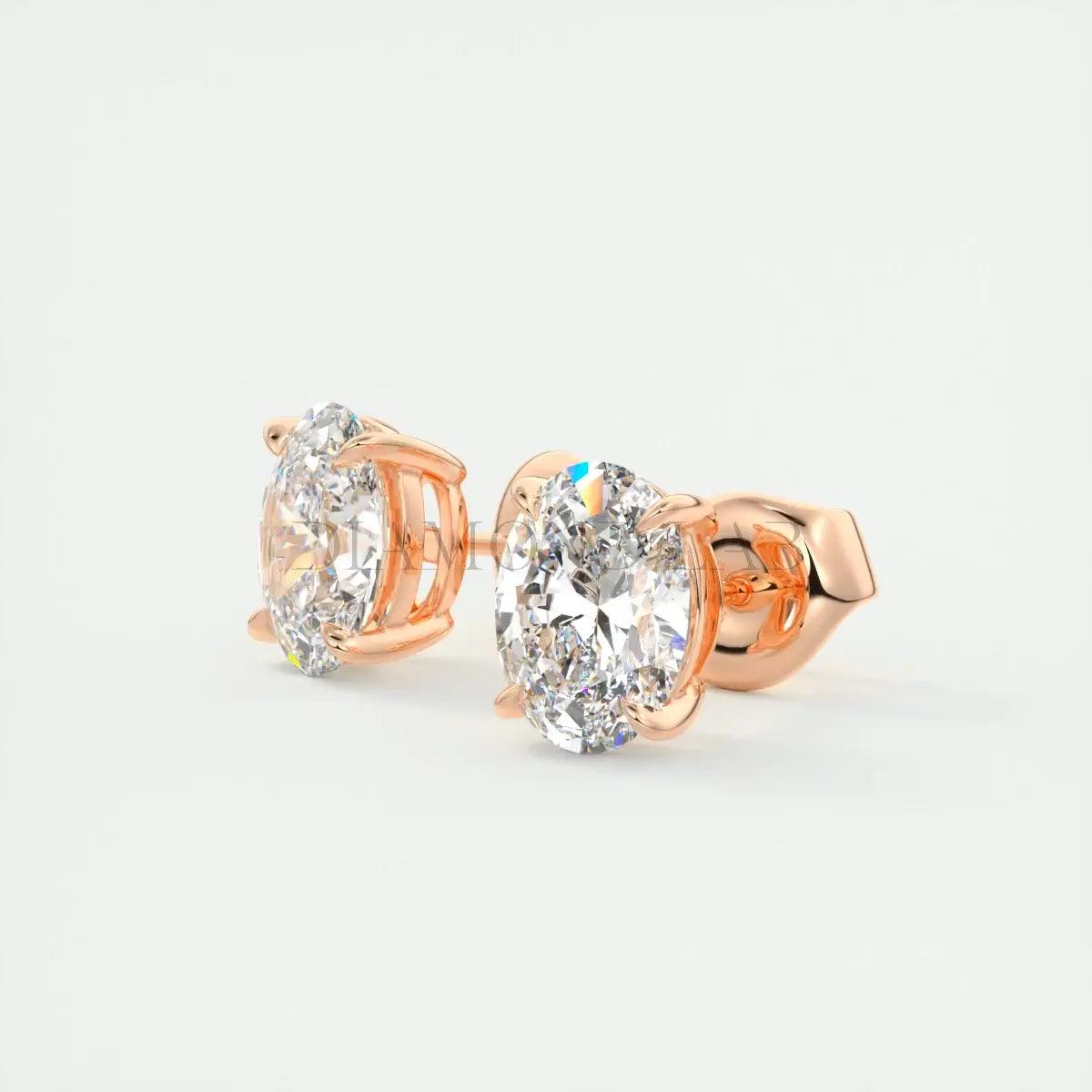 18k rose gold diamond stud earrings with a halo design.