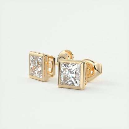Gold square stud earrings with princess cut diamonds