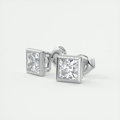 Princess cut diamond stud earrings in white gold.