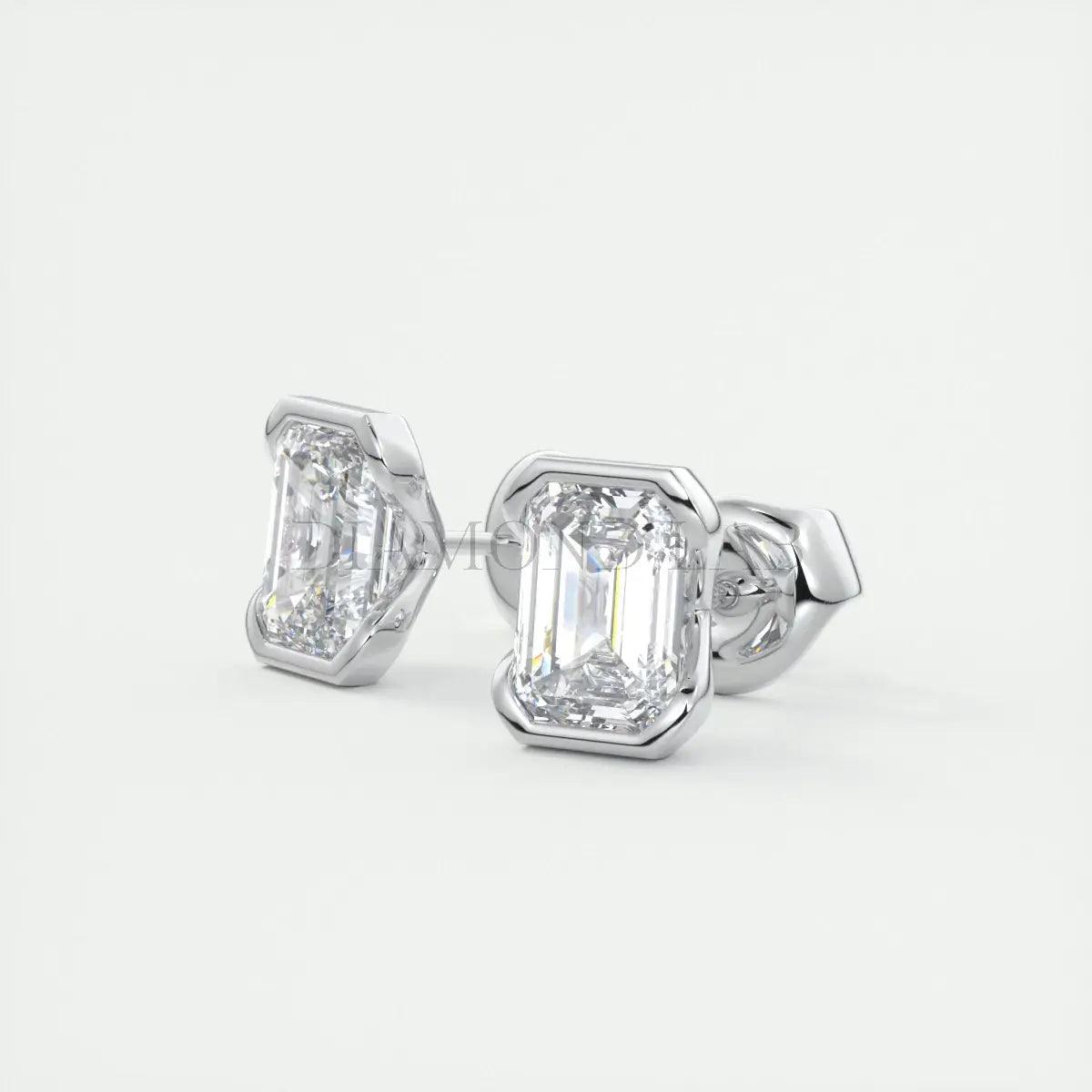 18k white gold diamond stud earrings with emerald cut diamonds.