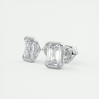 18k white gold diamond stud earrings with emerald cut diamonds.