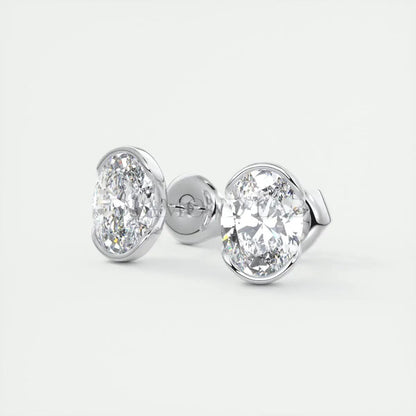 18k white gold diamond stud earrings.