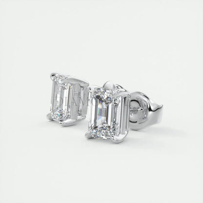 18k white gold emerald-cut diamond stud earrings.